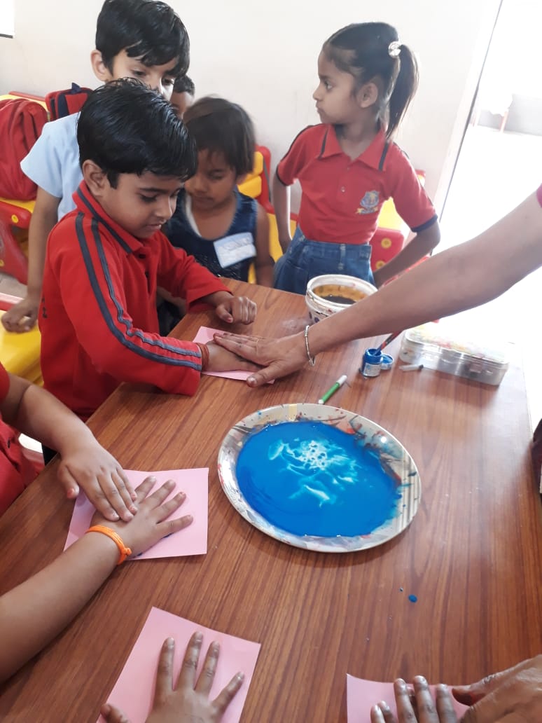 Today second day of tiny tots was filled with colours...Day was followed by morning assembly ,outdoor games,hand print and finger expression activities...